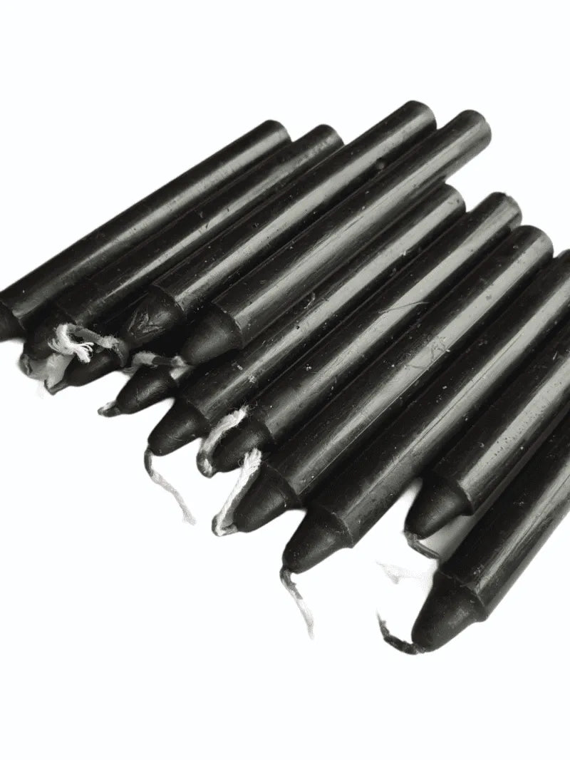 Black spell candle with black wax for banishing and protection magic from The Witches Hollow UK