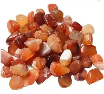 Carnelian tumble stone with orange crystal for creativity and sacral chakra energy from The Witches Hollow UK