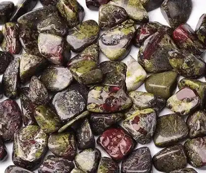 Dragonstone tumble stone with red green crystal for courage and heart healing from The Witches Hollow UK