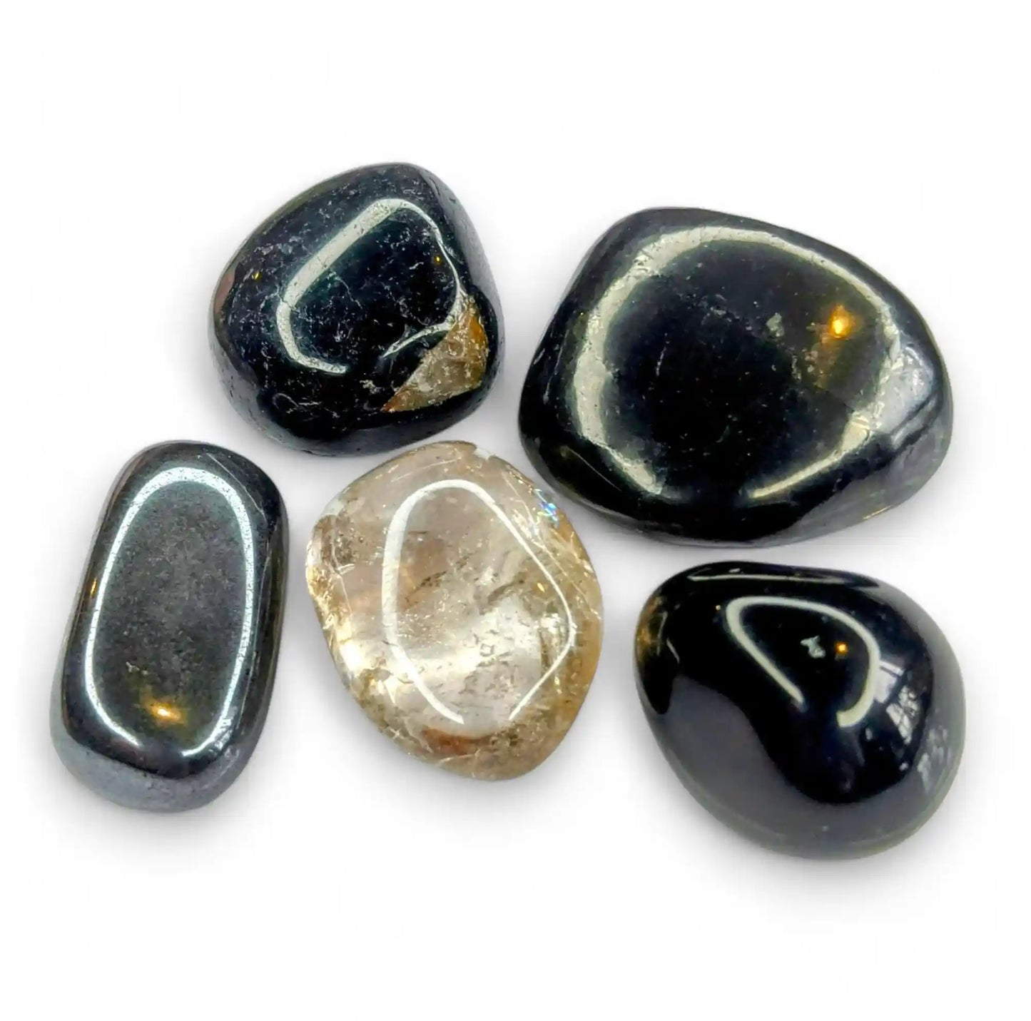 Grounding healing crystals set featuring hematite, black tourmaline, smoky quartz, obsidian and shungite for stability and balance