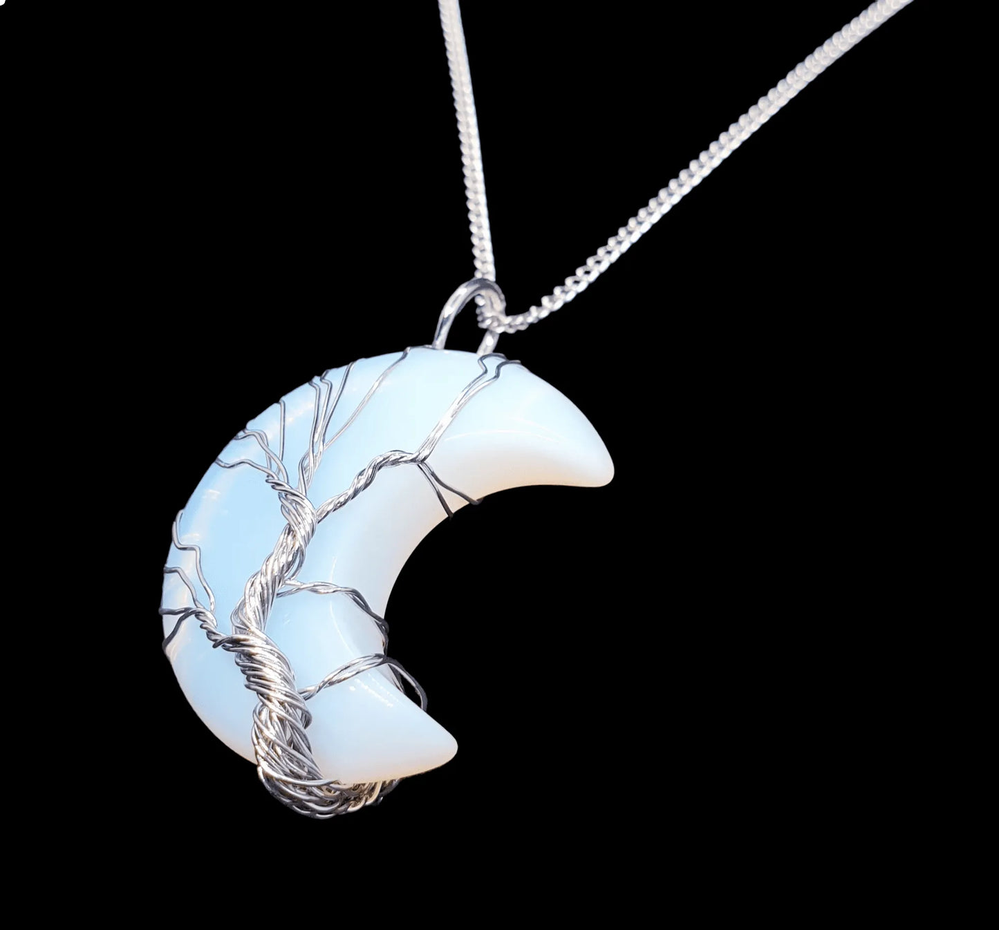 Opalite moon wire wrapped pendant with iridescent crystal crescent for moon magic and intuition from The Witches Hollow UK