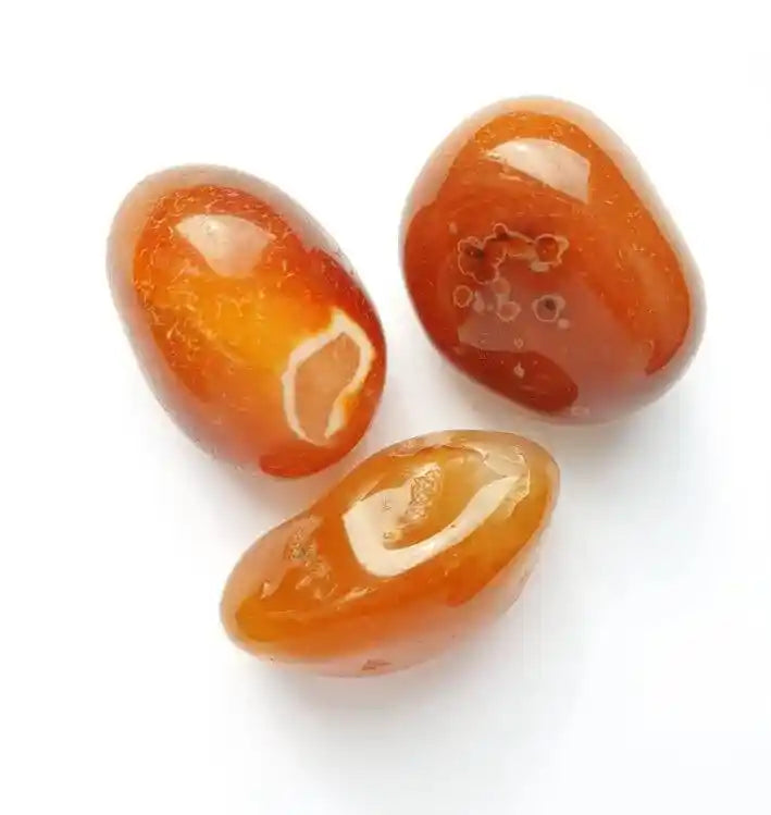 Orange agate tumble stone with orange crystal for creativity and sacral chakra energy from The Witches Hollow UK