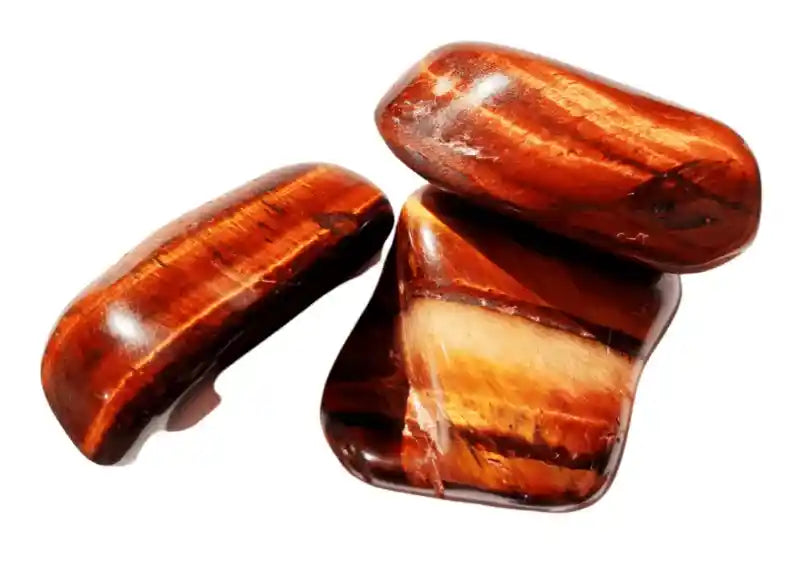 Red tigers eye tumble stone with red golden crystal for passion and root chakra grounding from The Witches Hollow UK