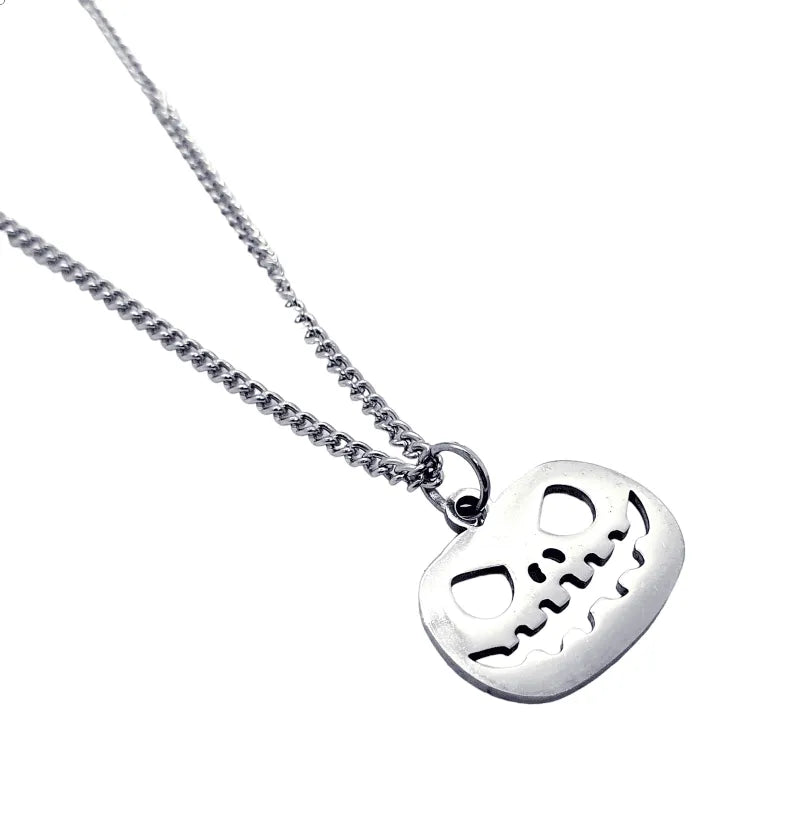 Smiling pumpkin necklace with Halloween pendant for seasonal gothic jewelry and autumn magic from The Witches Hollow UK