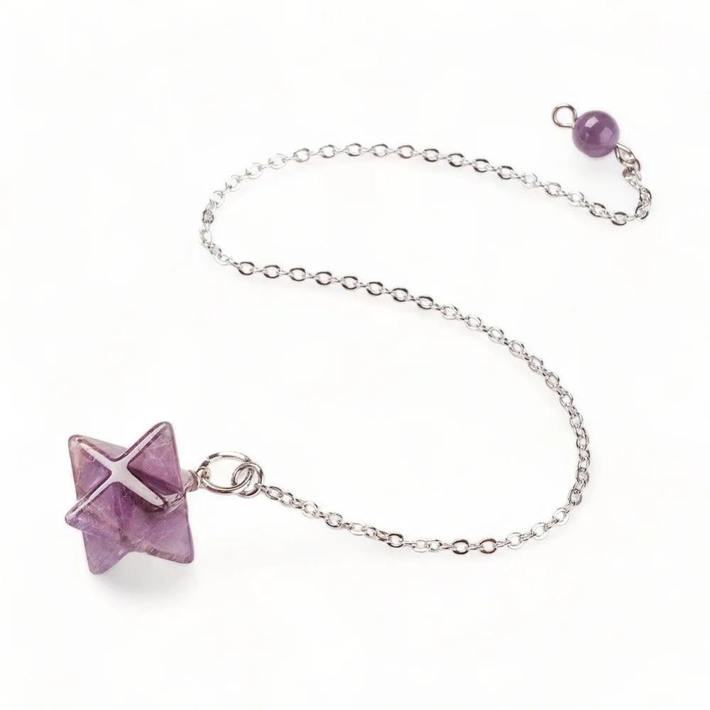 Amethyst merkaba dowsing pendulum detail with purple star crystal for crown chakra divination from The Witches Hollow UK