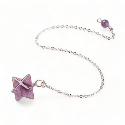 Amethyst merkaba dowsing pendulum detail with purple star crystal for crown chakra divination from The Witches Hollow UK