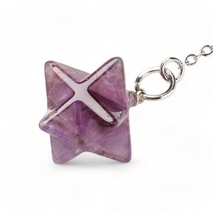 Amethyst merkaba pendulum scrying detail with purple star crystal for spiritual guidance from The Witches Hollow UK
