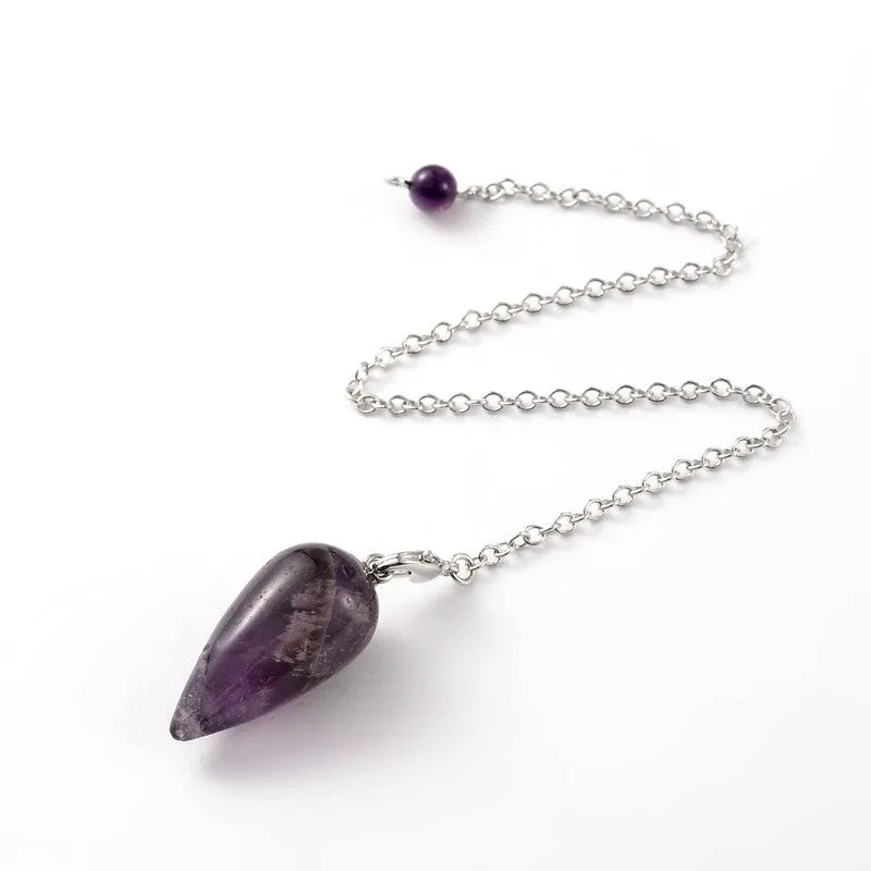 Amethyst teardrop pendulum with scrying board for crown chakra divination and spiritual wisdom from The Witches Hollow UK