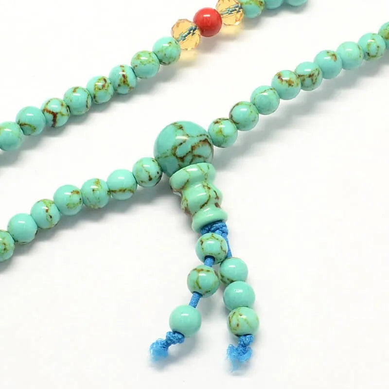 Aquamarine prayer beads with blue crystal mala for throat chakra healing and communication from The Witches Hollow UK