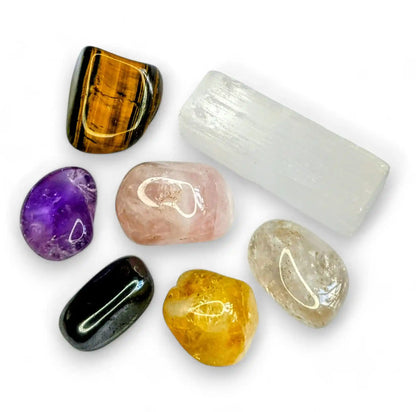 Healing crystals for beginners set featuring tigers eye, amethyst, selenite, rose quartz, clear quartz and hematite stones