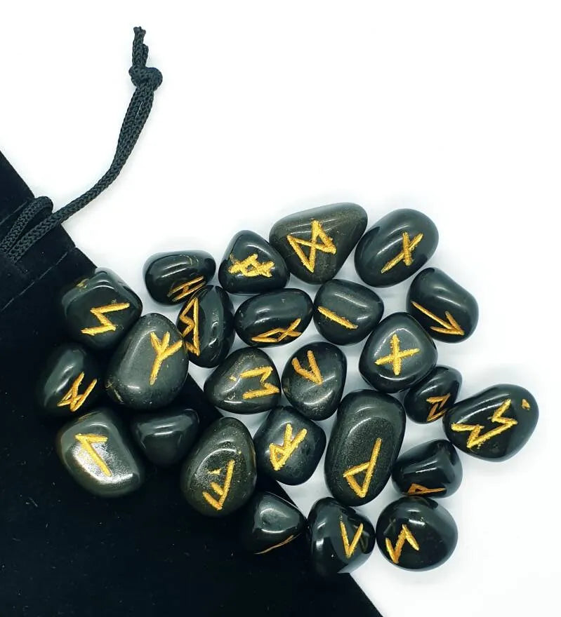 Black agate futhark rune set detail showing black stones for Norse divination and spiritual protection from The Witches Hollow UK