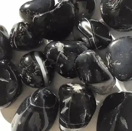 Black agate tumble stone with black crystal for protection and grounding energy from The Witches Hollow UK
