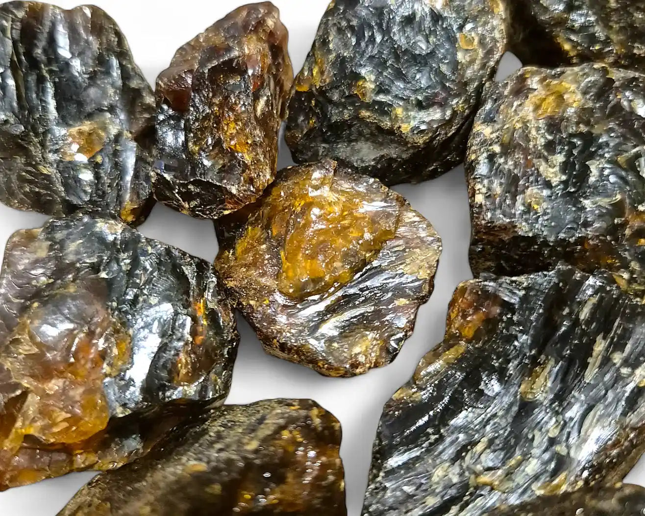 Black Sumatran amber crystal with dark fossilized resin for protection and healing from The Witches Hollow UK