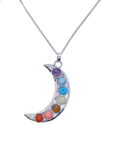 Chakra crescent moon pendant detail showing rainbow stones in lunar shape for chakra balance from The Witches Hollow UK