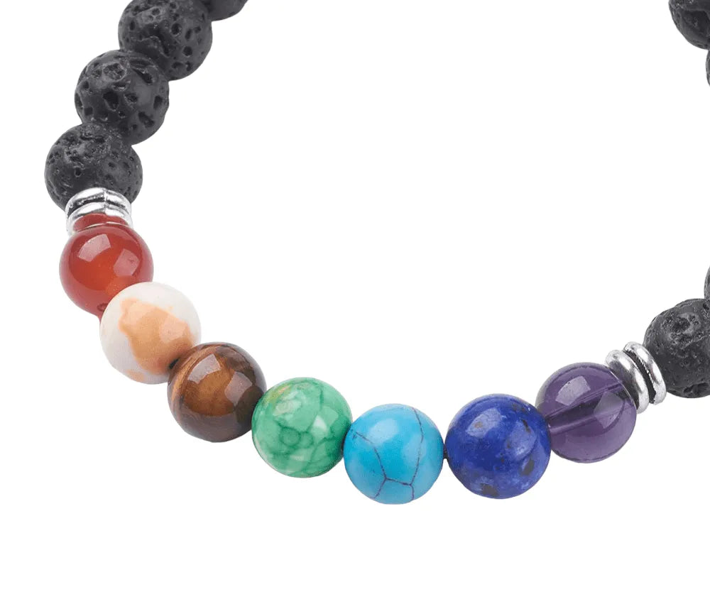 Chakra lava stone bracelet featuring seven chakra stones and volcanic beads for spiritual alignment from The Witches Hollow UK
