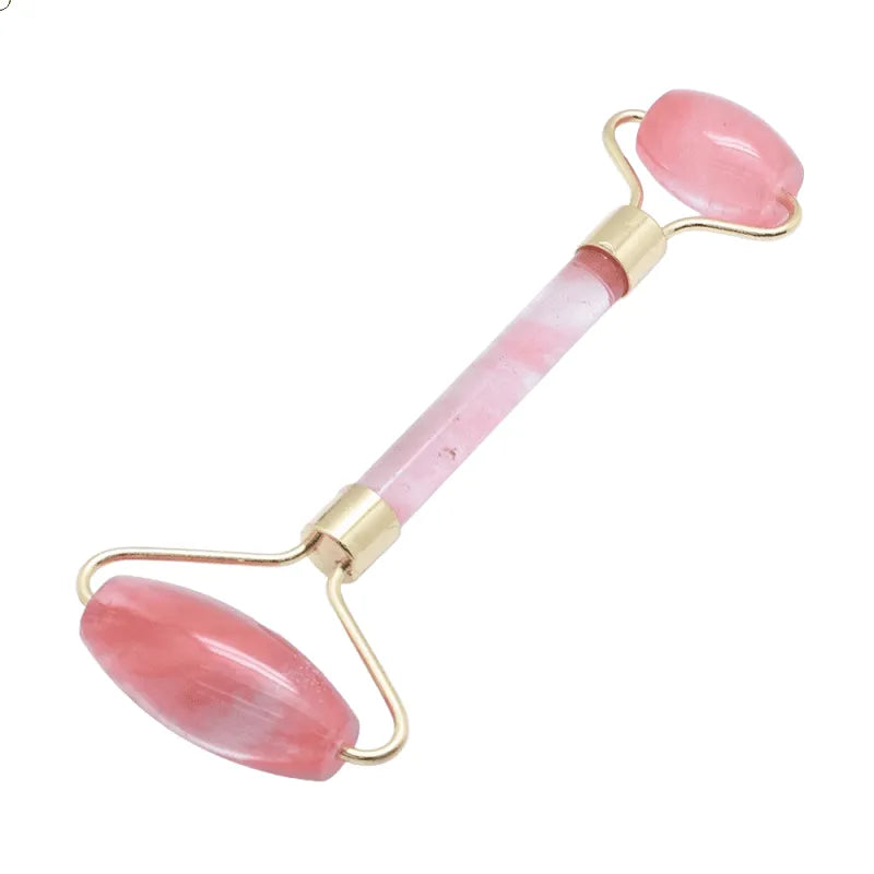 Cherry quartz facial roller detail showing pink crystal for beauty and heart chakra healing from The Witches Hollow UK