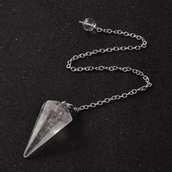 Clear quartz faceted cone pendulum alternative view showing clear crystal for energy amplification dowsing from The Witches Hollow UK