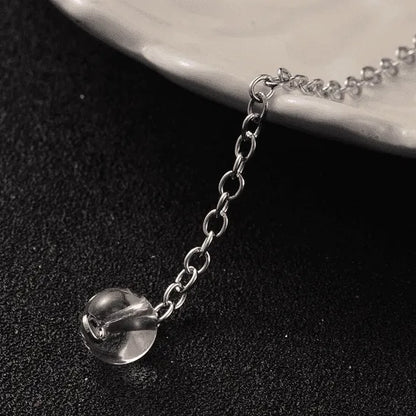 Clear quartz faceted cone pendulum with scrying board for enhanced spiritual communication and clarity from The Witches Hollow UK