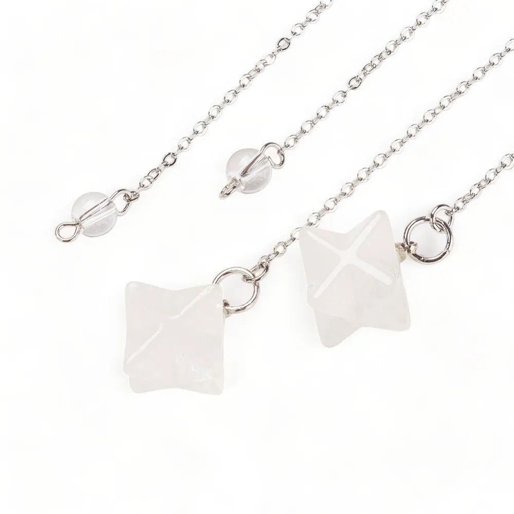 Clear quartz merkaba dowsing pendulum with clear star crystal for amplified spiritual guidance from The Witches Hollow UK