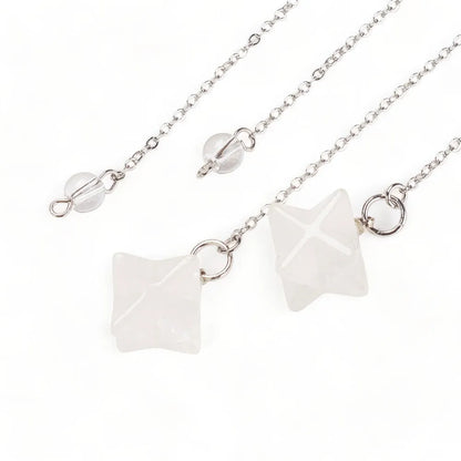 Clear quartz merkaba dowsing pendulum with clear star crystal for amplified spiritual guidance from The Witches Hollow UK