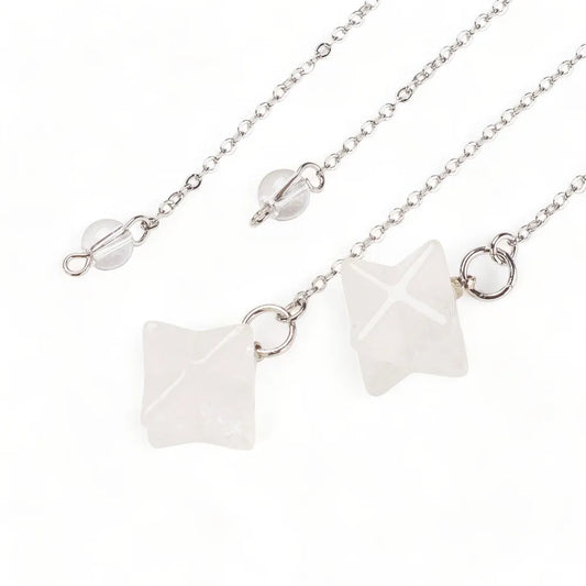 Clear quartz merkaba dowsing pendulum with clear star crystal for amplified spiritual guidance from The Witches Hollow UK