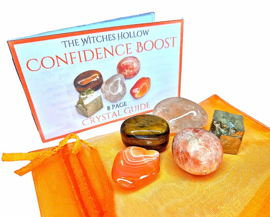 Confidence boost crystal healing pack with pyrite, tigers eye, sunstone, carnelian and clear quartz in orange organza bag with crystal guide from The Witches Hollow UK