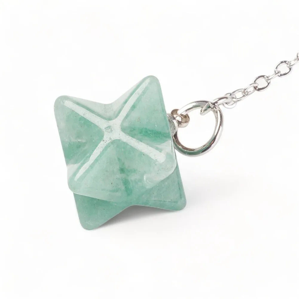 Green aventurine merkaba dowsing pendulum detail with star crystal for heart chakra guidance from The Witches Hollow UK