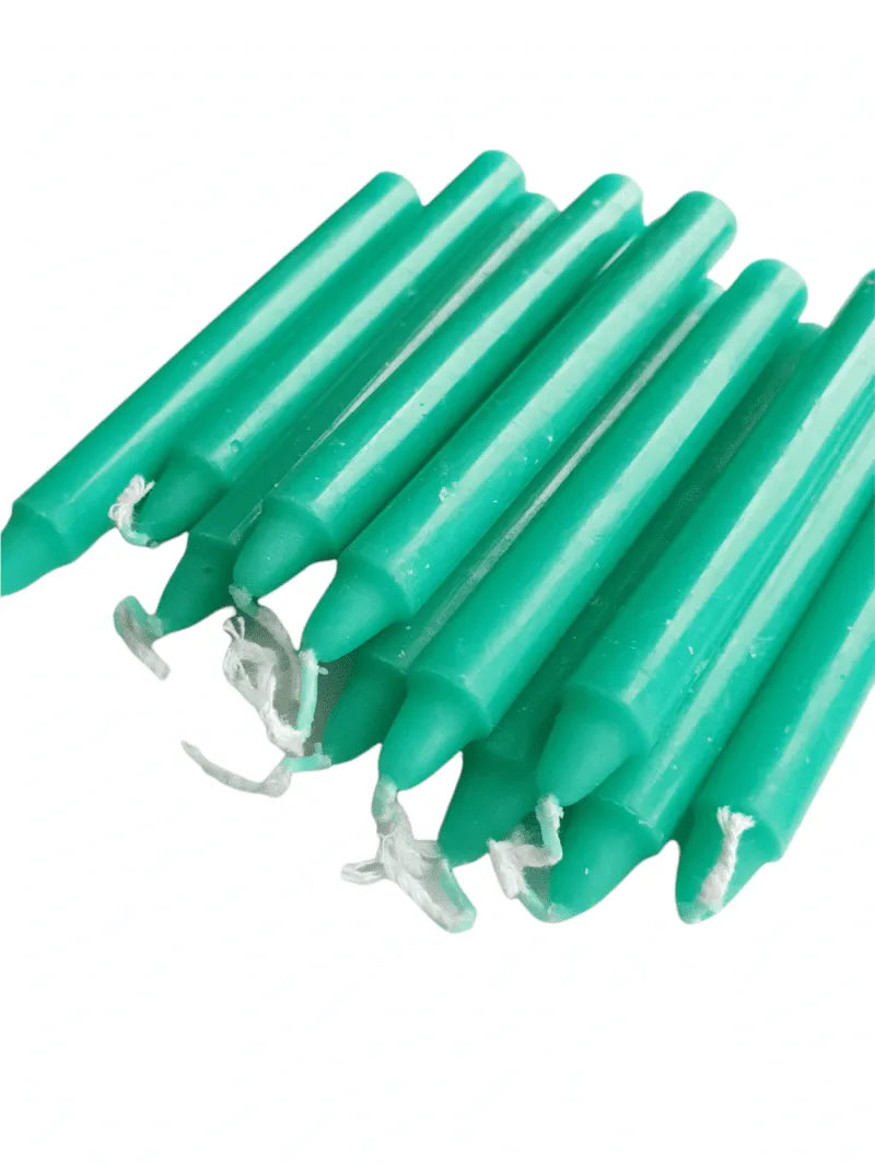 Green spell candle with green wax for prosperity and heart chakra magic from The Witches Hollow UK