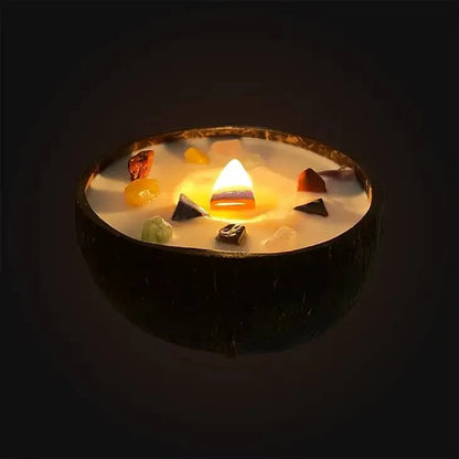 Handmade chakra coconut candle with rainbow crystals for chakra healing and natural lighting from The Witches Hollow UK