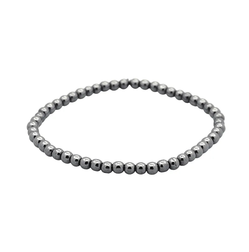 Hematite crystal bracelet detail with metallic black stones for grounding and protection energy from The Witches Hollow UK