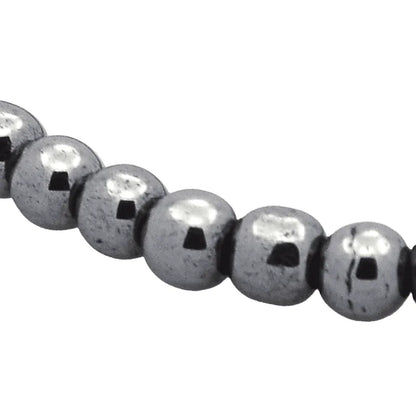 Hematite crystal bracelet featuring black metallic stones for root chakra grounding and strength from The Witches Hollow UK