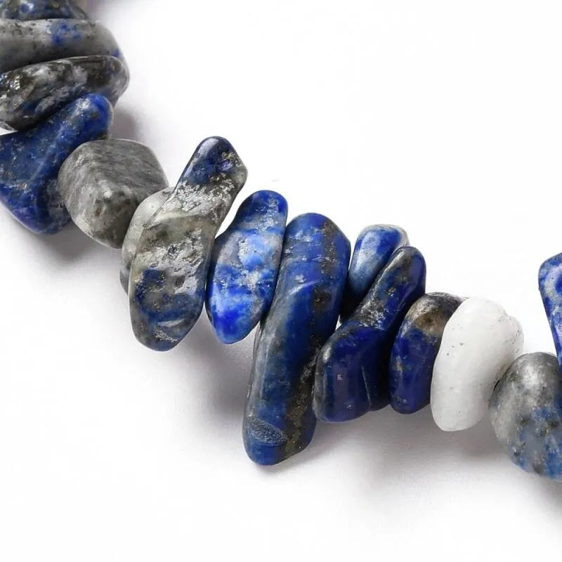 Lapis lazuli crystal bracelet detail showing blue stone beads for truth and enhanced communication from The Witches Hollow UK