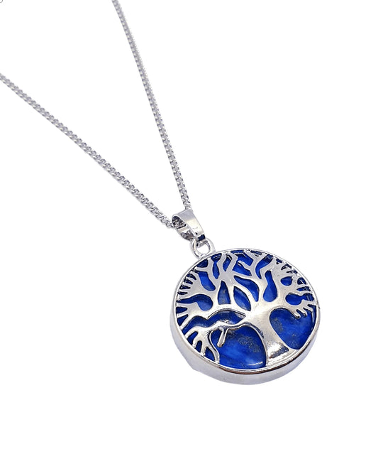 Lapis lazuli round tree pendant detail showing blue crystal tree for wisdom and spiritual growth from The Witches Hollow UK