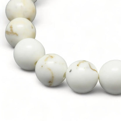 Magnesite crystal bracelet detail with white stones for peace and emotional healing from The Witches Hollow UK