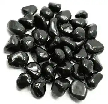 Onyx tumble stone with black crystal for protection and grounding energy from The Witches Hollow UK