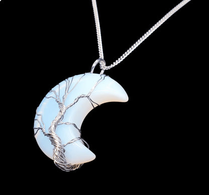 Opalite moon wire wrapped pendant with iridescent crystal crescent for moon magic and intuition from The Witches Hollow UK