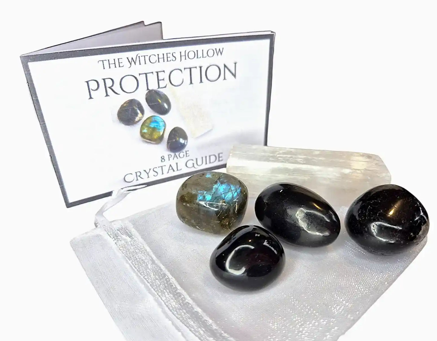 Protection crystal pack complete set showing crystals, white drawstring pouch and 8-page crystal guide booklet for negative energy shielding and spiritual protection - The Witches Hollow UK
