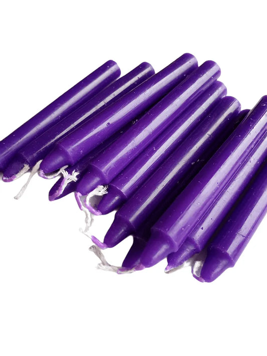 Purple spell candle with purple wax for spirituality and crown chakra magic from The Witches Hollow UK