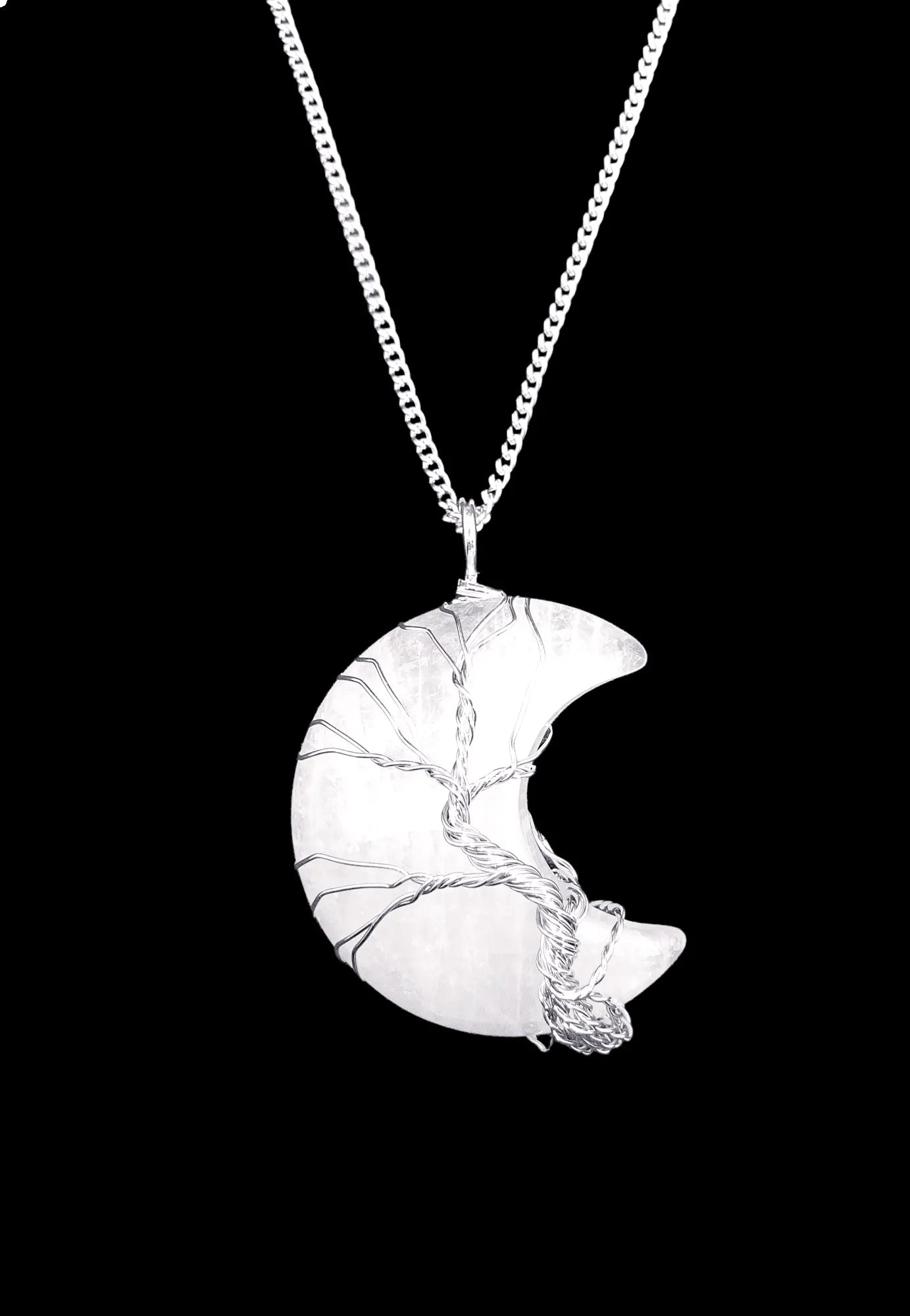 Quartz moon wire wrapped pendant detail showing clear crystal moon for amplified lunar magic from The Witches Hollow UK