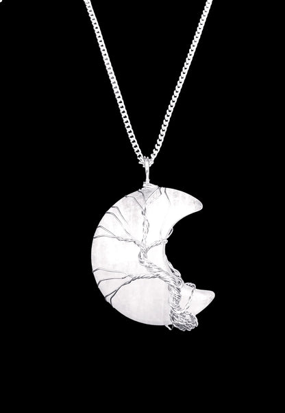 Quartz moon wire wrapped pendant detail showing clear crystal moon for amplified lunar magic from The Witches Hollow UK