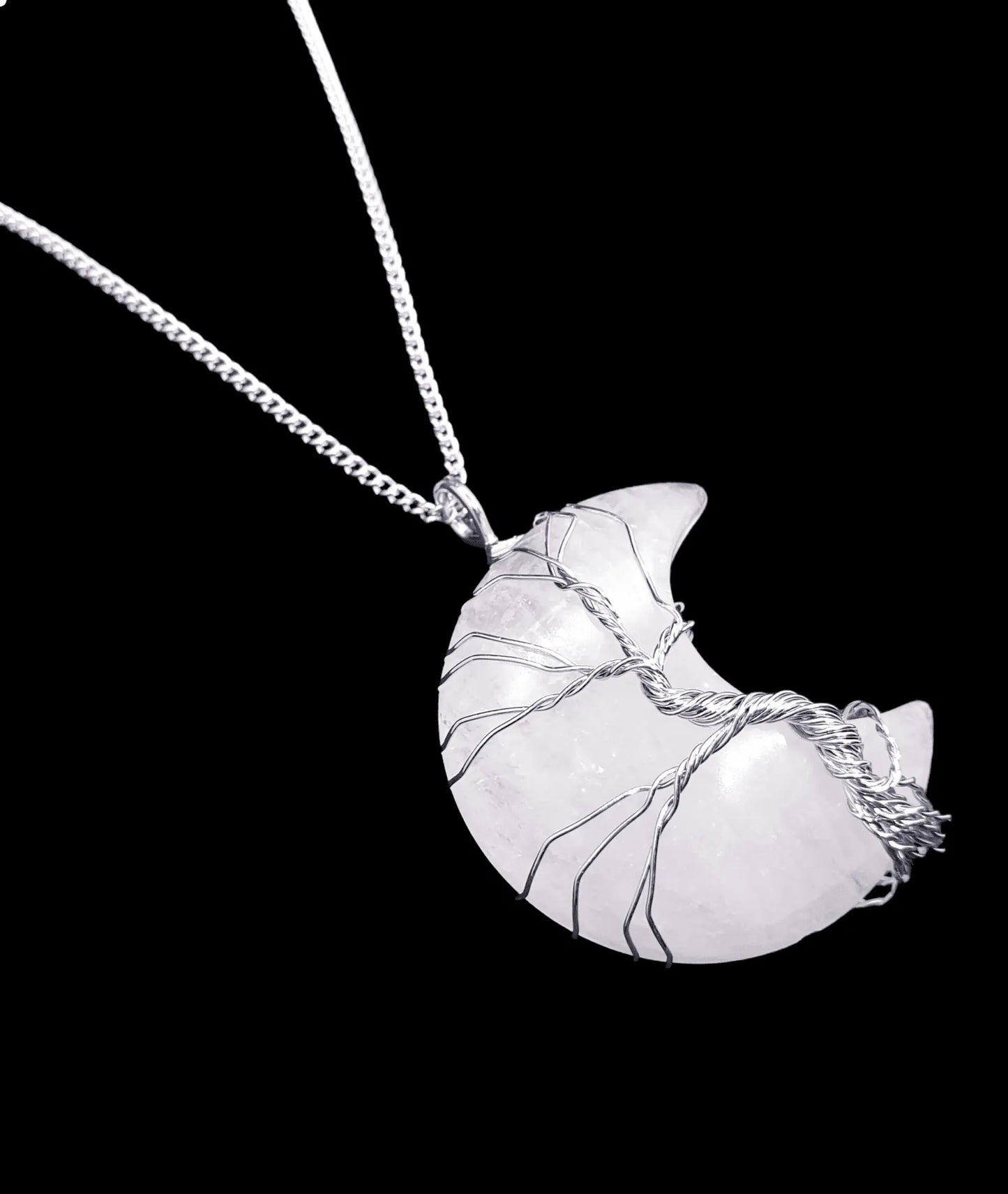 Quartz moon wire wrapped pendant with clear crystal crescent for lunar energy and intuition from The Witches Hollow UK