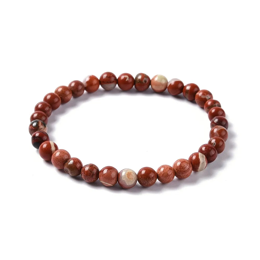 Red jasper crystal bracelet with red stone beads for vitality and root chakra grounding from The Witches Hollow UK