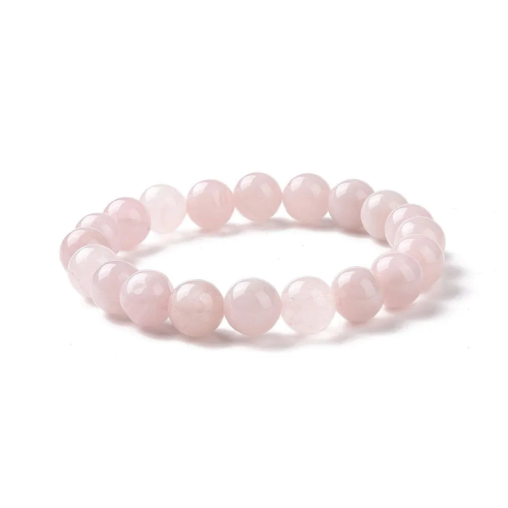 Rose quartz crystal bracelet detail with pink stones for unconditional love and heart healing from The Witches Hollow UK