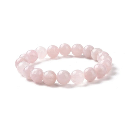 Rose quartz crystal bracelet detail with pink stones for unconditional love and heart healing from The Witches Hollow UK