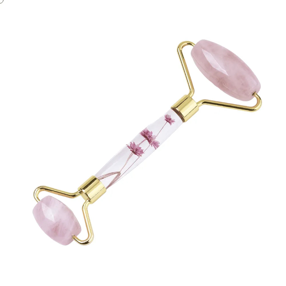 Rose quartz crystal facial roller for skincare with pink healing stone for self-love from The Witches Hollow UK