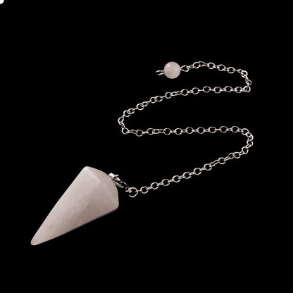 Rose quartz faceted cone pendulum scrying detail showing pink crystal for heart chakra guidance from The Witches Hollow UK