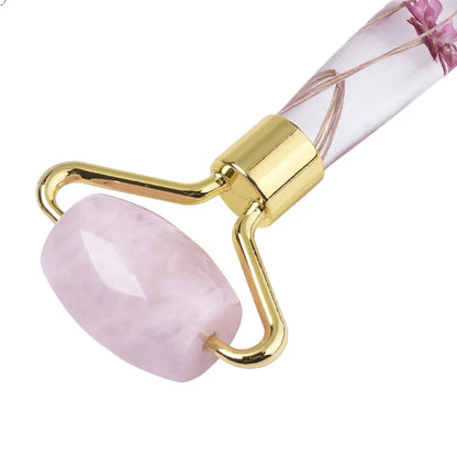 Rose quartz facial roller detail with pink crystal for skincare and emotional healing from The Witches Hollow UK