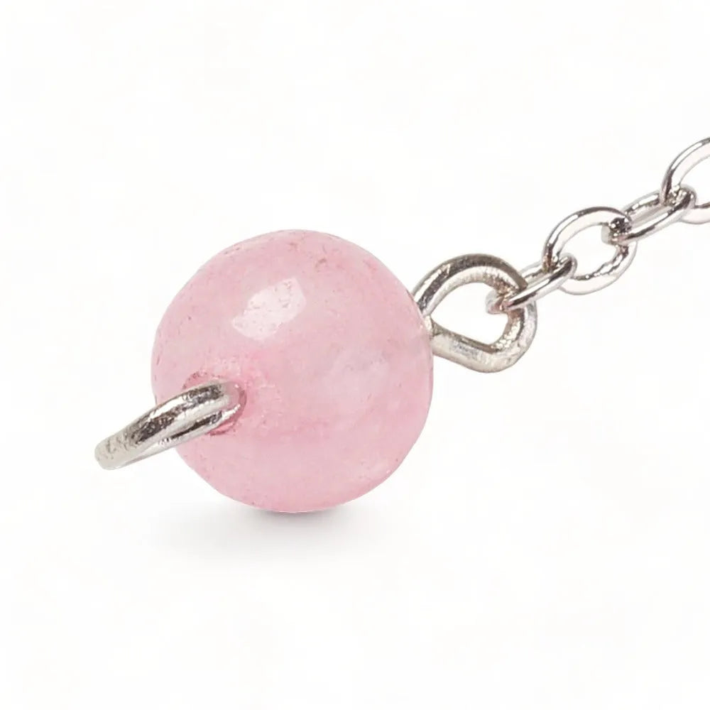 Rose quartz merkaba dowsing pendulum detail with pink crystal star for heart chakra divination from The Witches Hollow UK