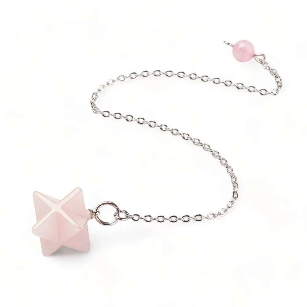 Rose quartz merkaba pendulum with scrying board for love divination and heart chakra guidance from The Witches Hollow UK