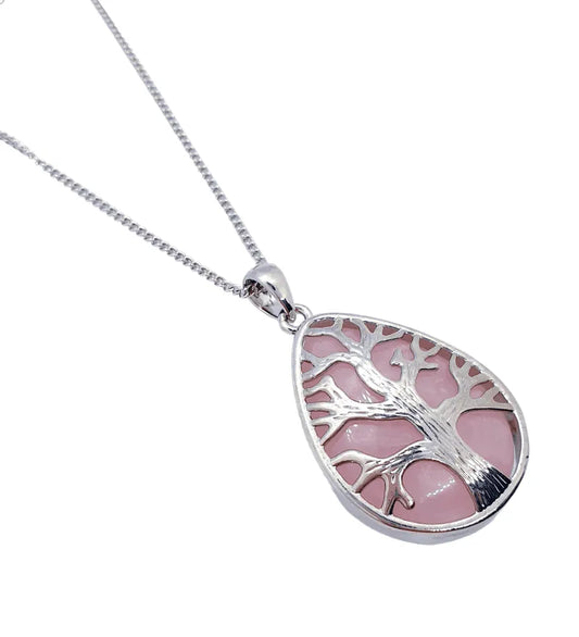 Rose quartz pendant detail with pink crystal for unconditional love and heart chakra healing from The Witches Hollow UK